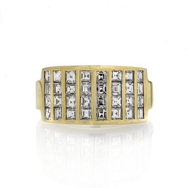 Anello a fascia in oro giallo e diamanti