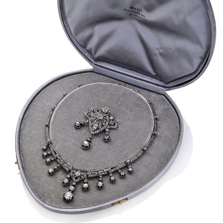 Importante collier in oro a basso titolo, argento e diamanti
