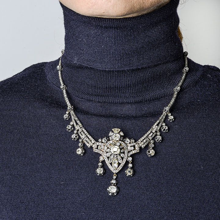 Importante collier in oro a basso titolo, argento e diamanti