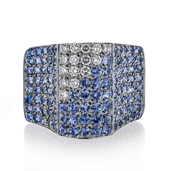 Large bridge ring in white gold, diamonds and sapphires