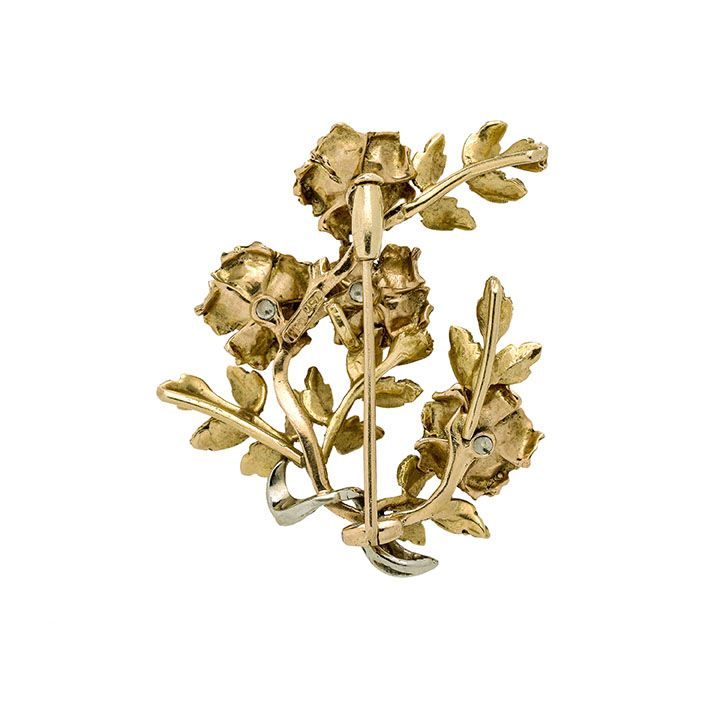 Spilla floreale in oro giallo e zaffiri