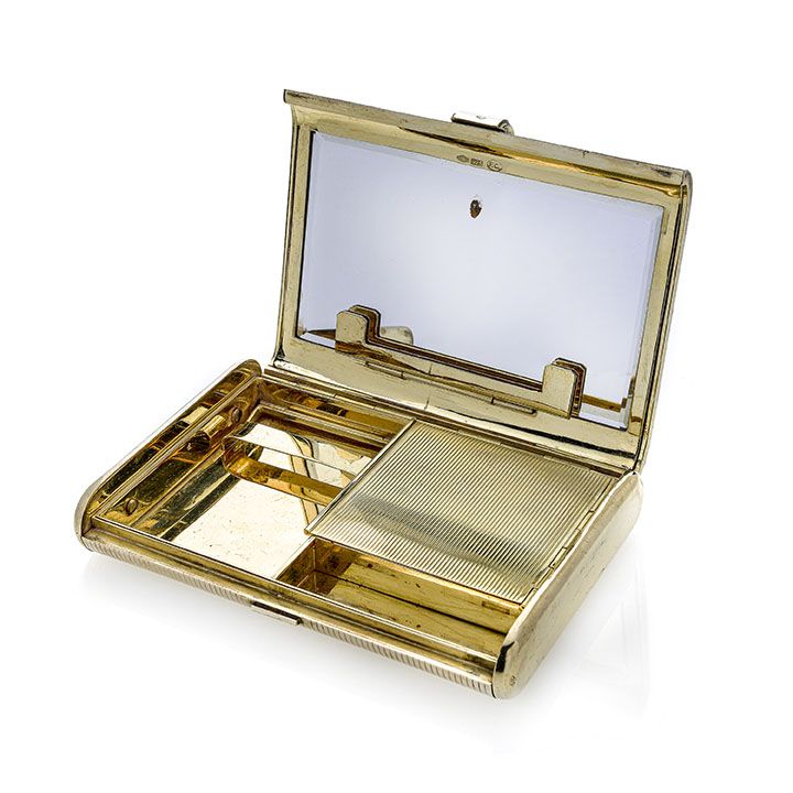 Trousse in argento dorato con fibbia in oro giallo
