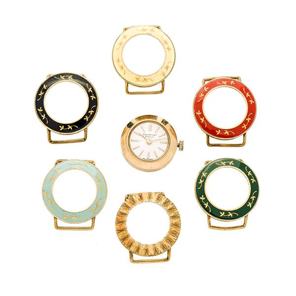 Girl's watch in golden metal and colored enamel