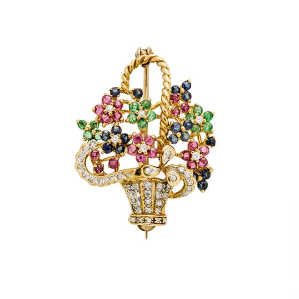 Basket brooch in yellow gold, sapphires, rubies, emeralds and diamonds