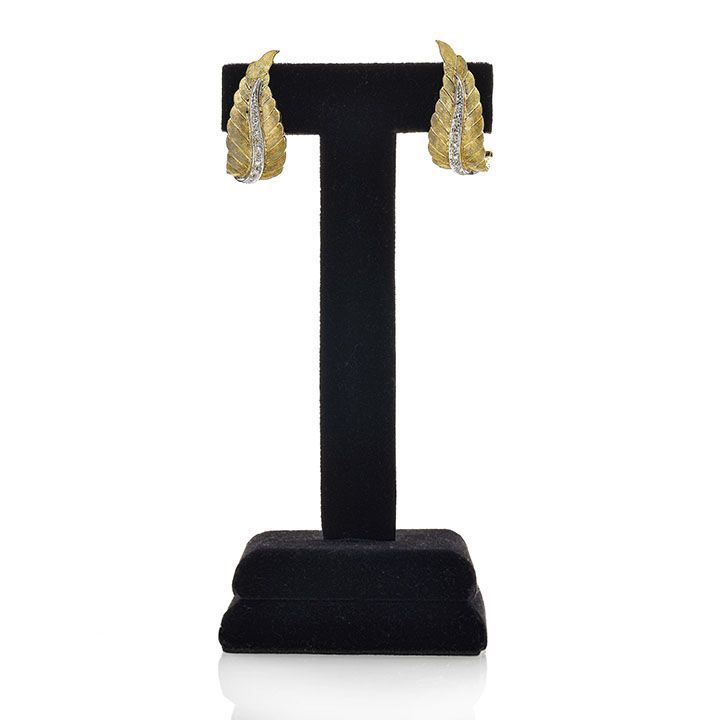 Paio di orecchini a clips in oro giallo, oro bianco e diamanti