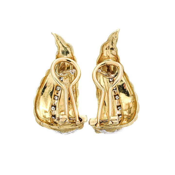 Paio di orecchini a clips in oro giallo, oro bianco e diamanti