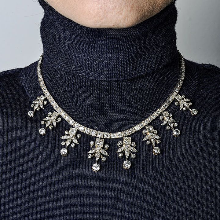 Importante collier in oro a basso titolo, argento e diamanti