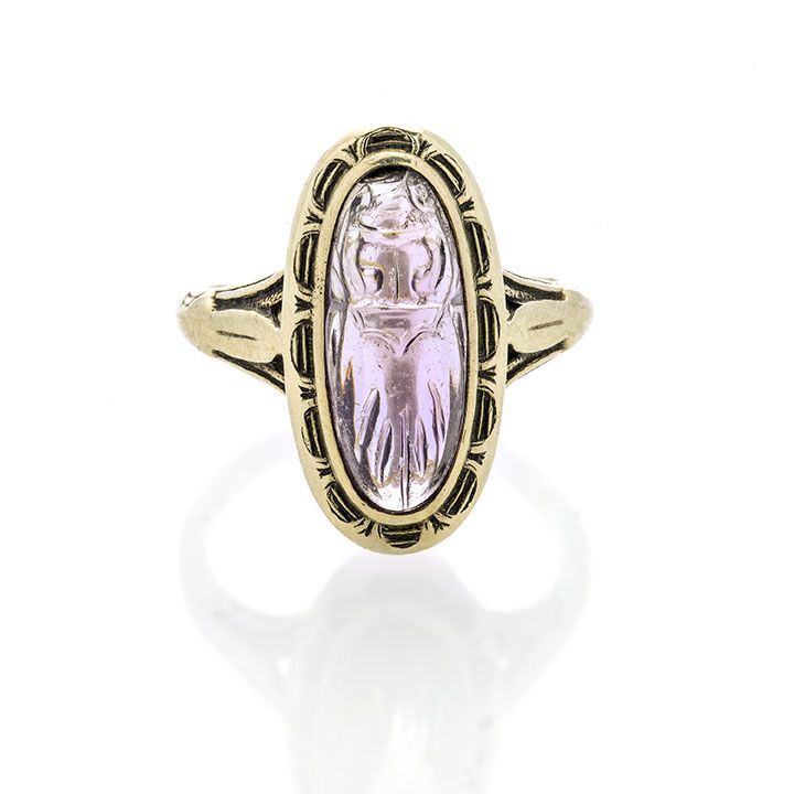 Anello in oro a basso titolo e ametista incisa