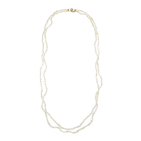 Two strand necklace of natural pearls, yellow gold and diamonds