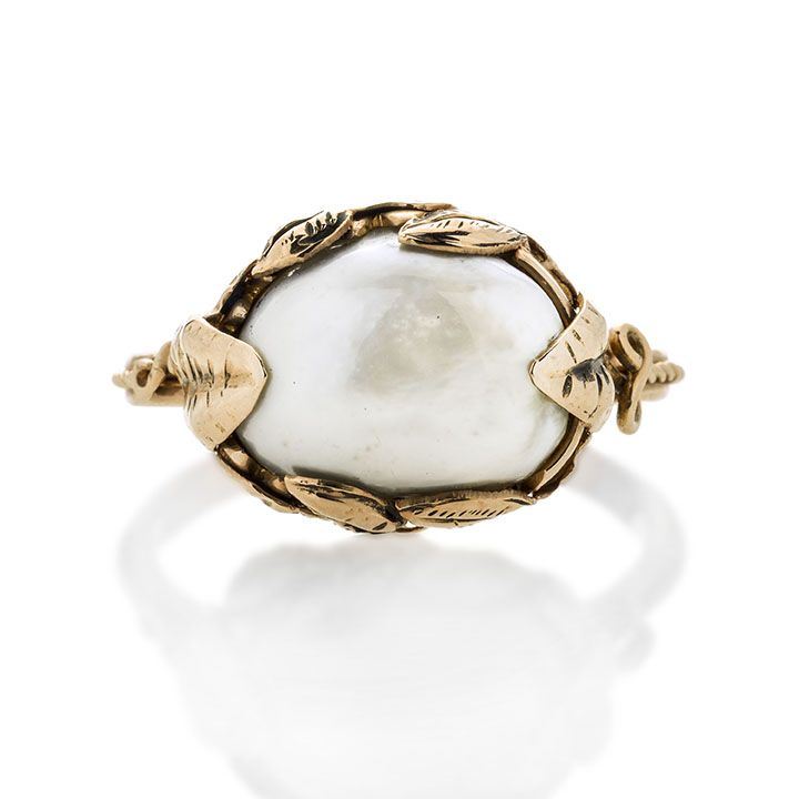 Anello in oro a basso titolo e perla naturale