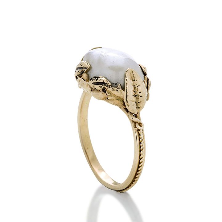 Anello in oro a basso titolo e perla naturale