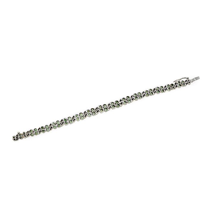Bracciale in oro bianco, diamanti e smeraldi