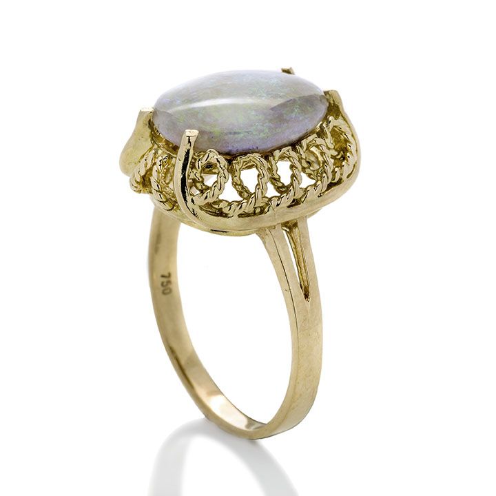 Anello in oro giallo e opale bianco arlecchino