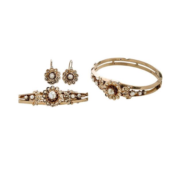 Parure in yellow gold and mabè pearl