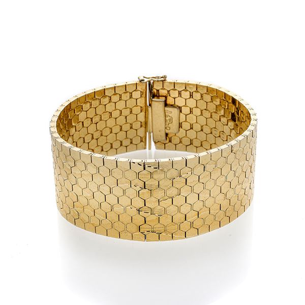 High bracelet in engraved yellow gold