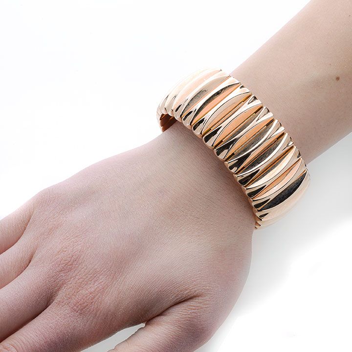Alto bracciale in oro giallo