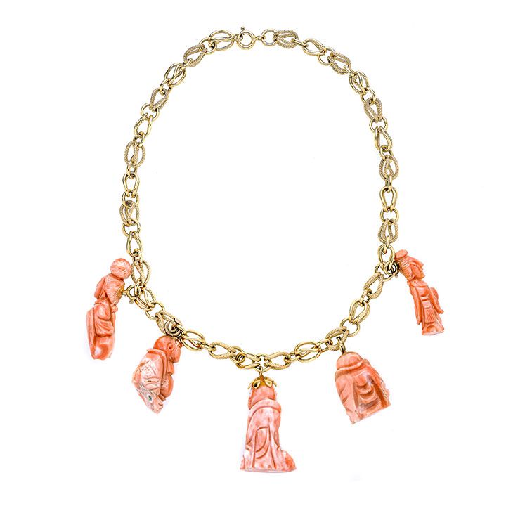 Girocollo in oro giallo con charms in corallo rosa