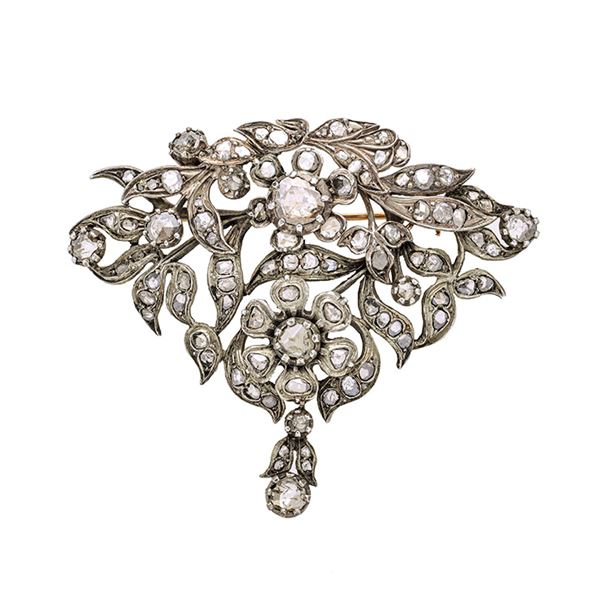 Large brooch in low title gold, silver and diamonds