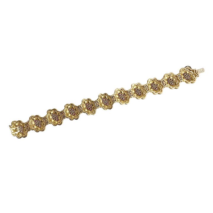 Bracciale in oro giallo, rubini e diamanti