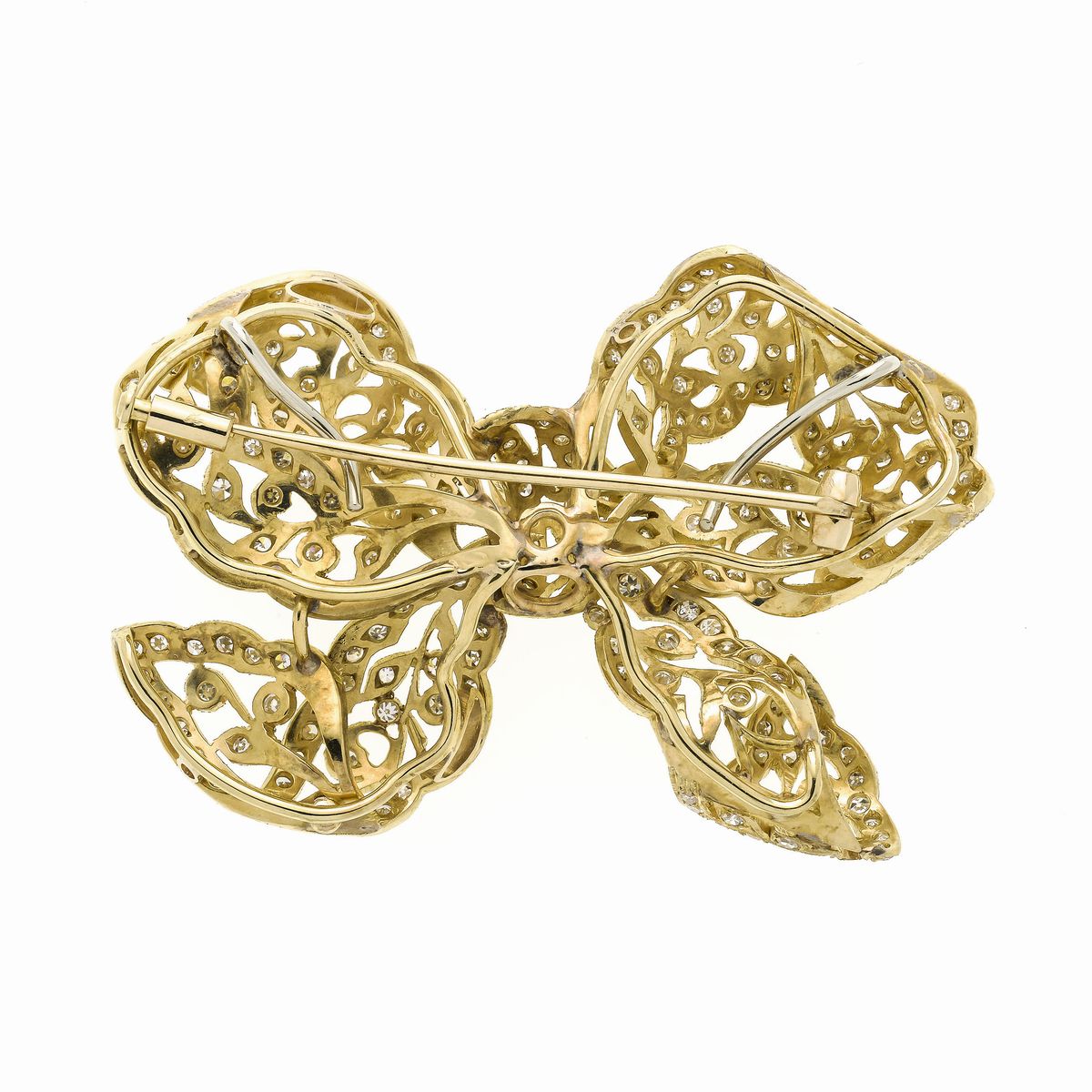 Spilla fiocco in oro giallo e diamanti