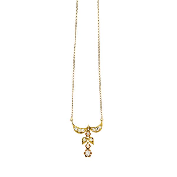 Necklace in yellow gold and diamonds