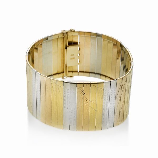 Alto bracciale in oro giallo, oro bianco e oro rosa