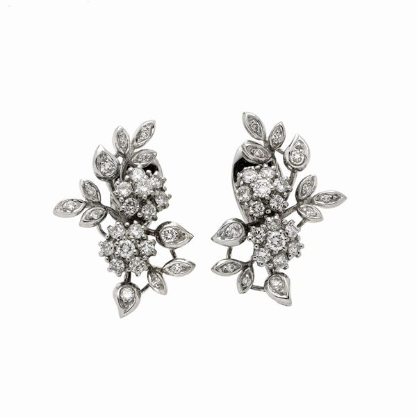 Pair of clip earrings in white gold and diamonds