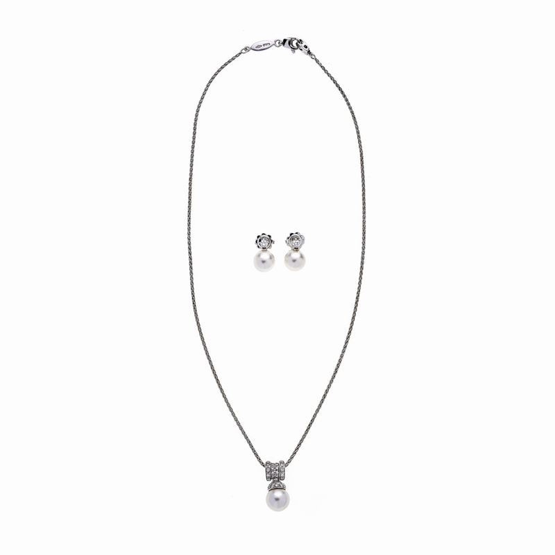 Parure in oro bianco, perle e diamanti