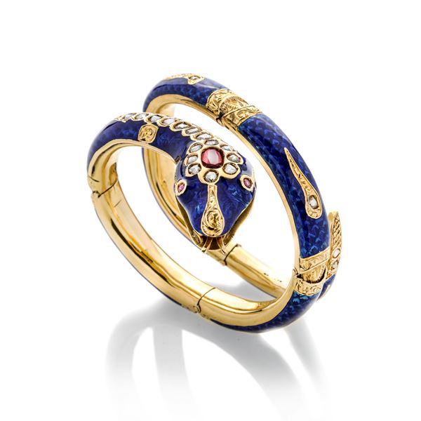 Large semi-rigid snake bracelet in yellow gold, blue enamel, diamonds and rubies