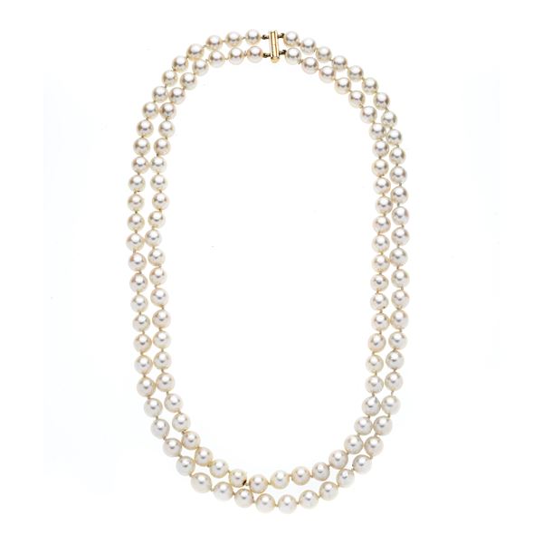 Two-strand necklace in cultured pearls and yellow gold