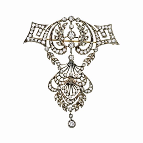 Large brooch in low title gold, silver and diamonds