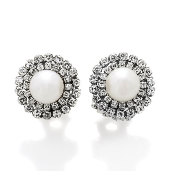 Pair of clip earrings in white gold, diamond and pearl