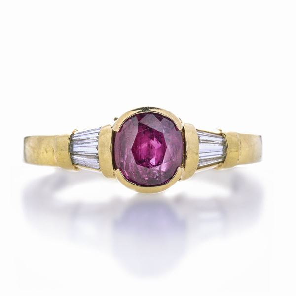 Anello in oro giallo, diamanti e rubino