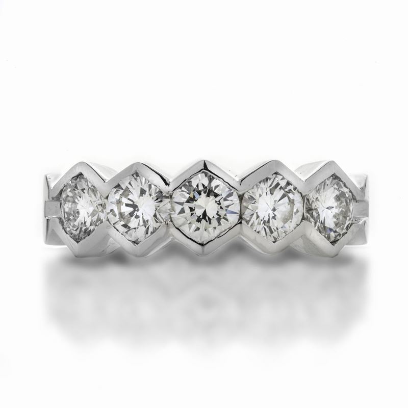 Anello riviere in oro bianco e diamanti