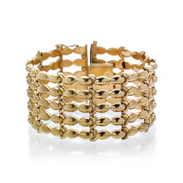 High bracelet in yellow gold