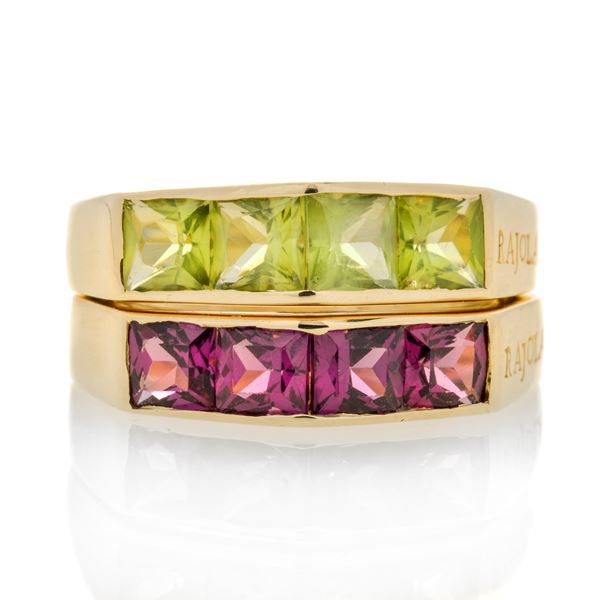 Ring in yellow gold and green and pink peridot