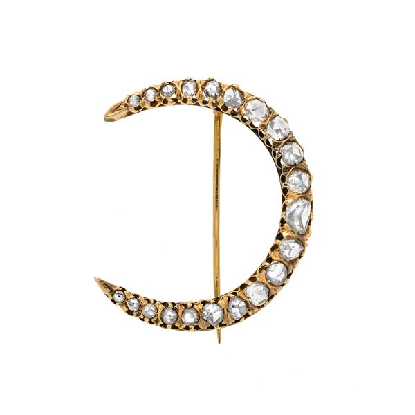 Half moon brooch in yellow gold and diamonds
