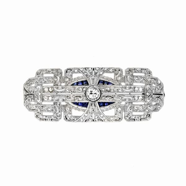 Brooch in platinum, diamonds and sapphires