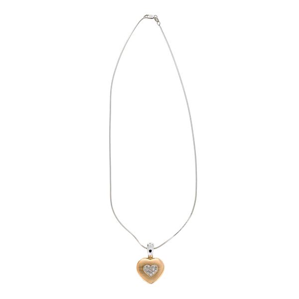 Chain with heart pendant in white gold, yellow gold and diamonds