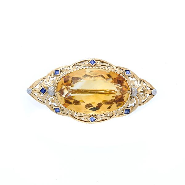 Brooch in yellow gold, diamonds, sapphires and yellow quartz