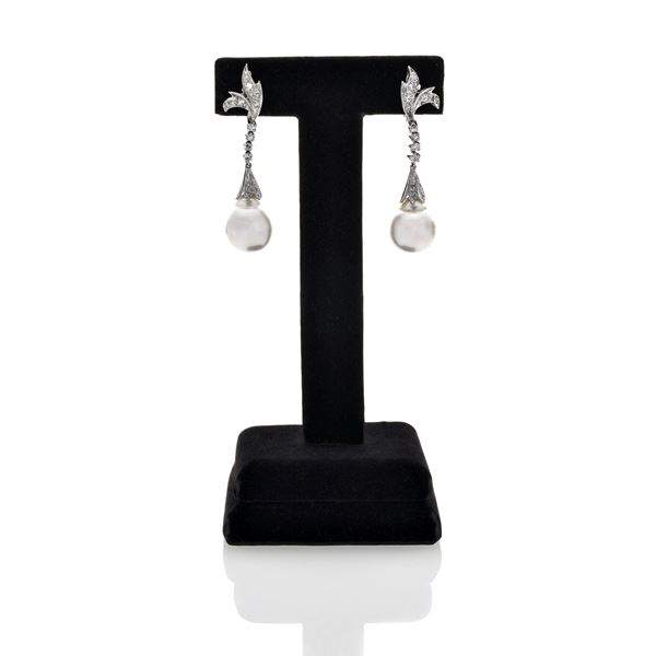 Pair of pendant earrings in white gold, diamonds and cultured pearls