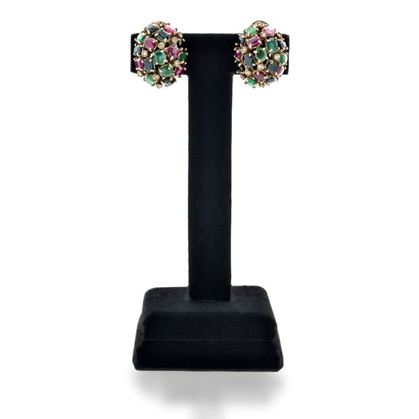 Pair of low-titer gold clip earrings with diamonds, emeralds, sapphires and rubies