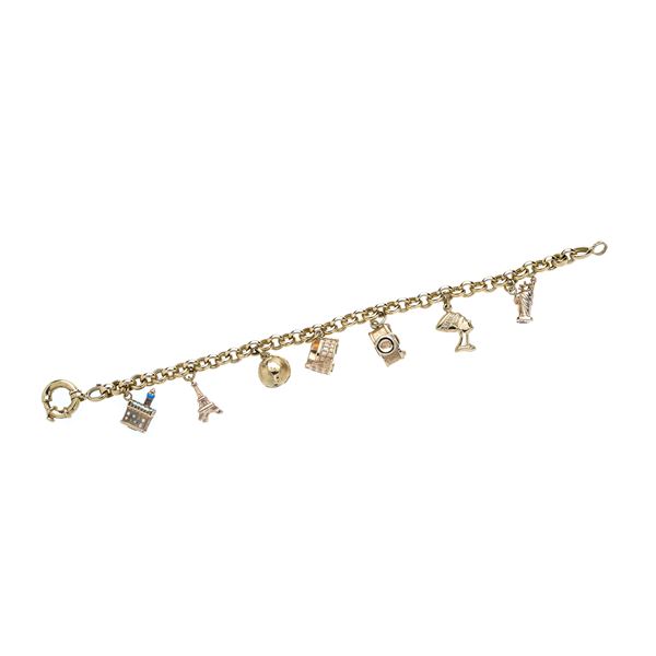 Yellow gold bracelet with "travel memories" charms  (Eighties)  - Auction Auction of Antique Jewelry, Modern and Watches - Curio - Casa d'aste in Firenze