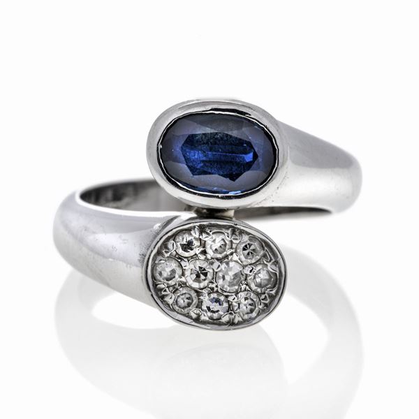 Contrariè ring in white gold, sapphire and diamonds