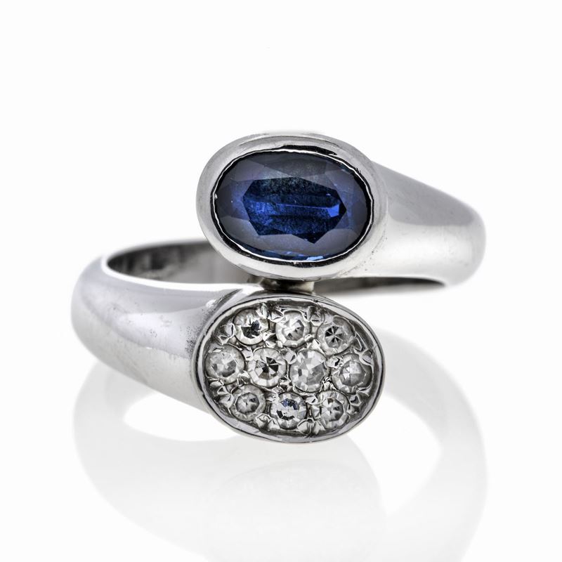 Anello Contrariè in Oro Bianco, Zaffiro e Diamanti