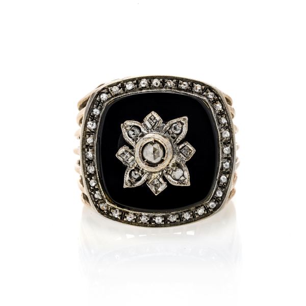Shield ring in low title gold, silver, onyx and diamonds