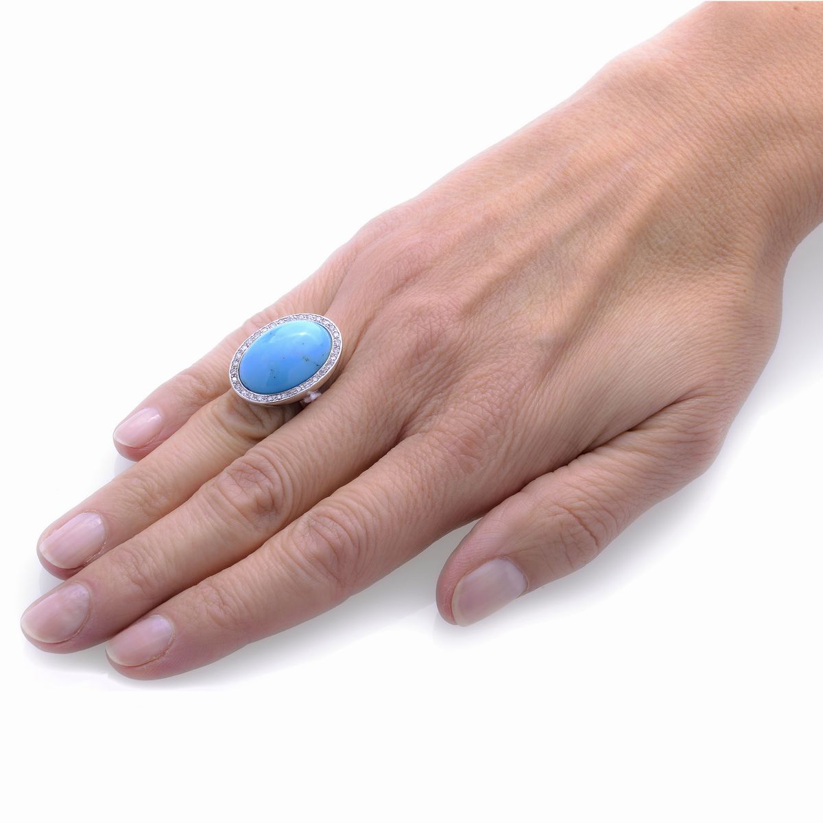 Grande anello in oro bianco, diamanti e turchese