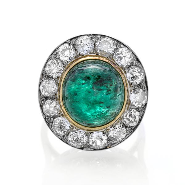 Ring in white gold, yellow gold, diamonds and emerald