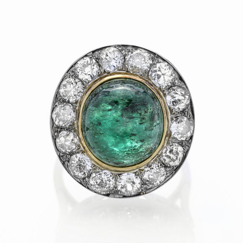 Anello in oro bianco, oro giallo, diamanti e smeraldo