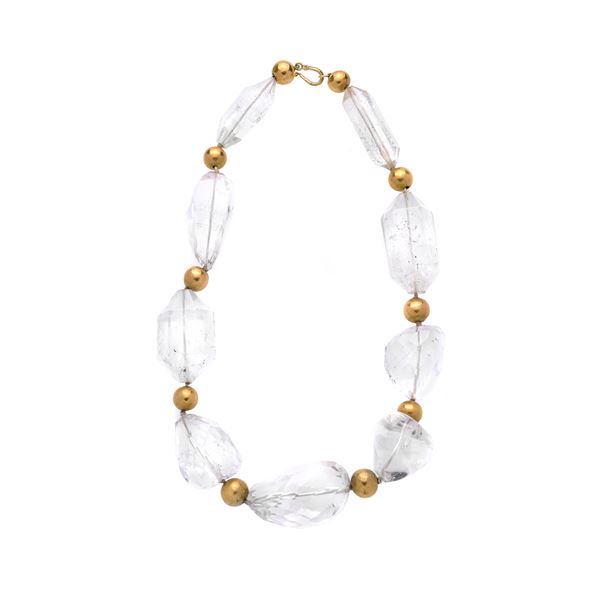 Necklace in yellow gold and rock crystal